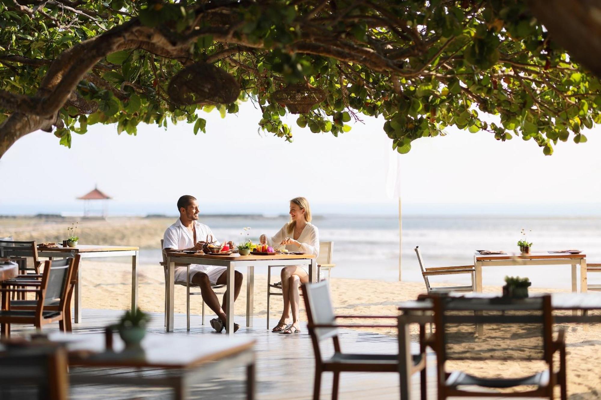 Nusa Dua Beach Hotel And Spa - Handwritten Collection Exterior photo Beachfront dining at The Samaya Ubud