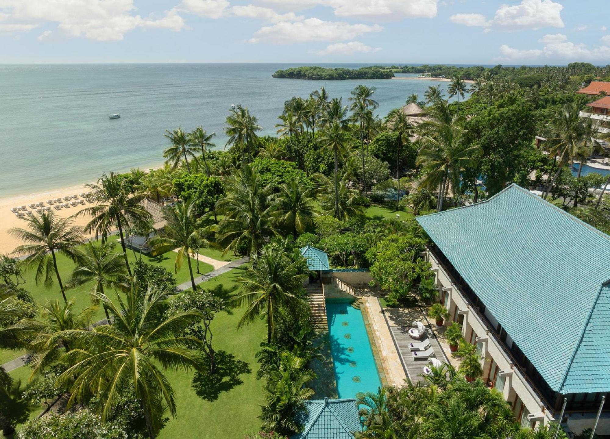 Nusa Dua Beach Hotel And Spa - Handwritten Collection Exterior photo The hotel's beach and pool