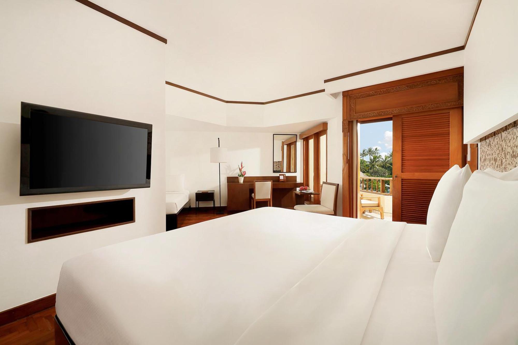 Nusa Dua Beach Hotel And Spa - Handwritten Collection Exterior photo A bedroom at the hotel