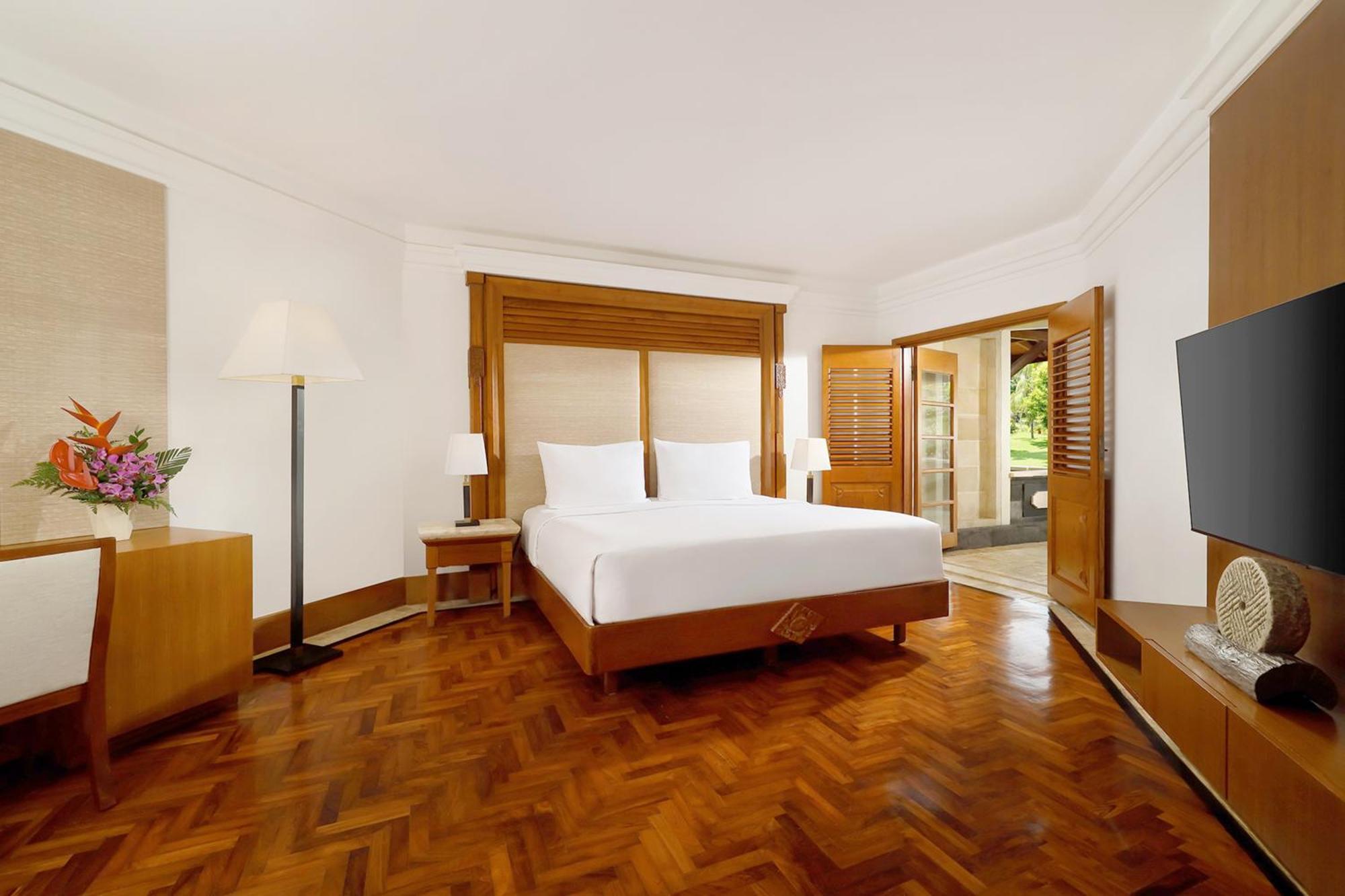 Nusa Dua Beach Hotel And Spa - Handwritten Collection Exterior photo A bedroom at the hotel