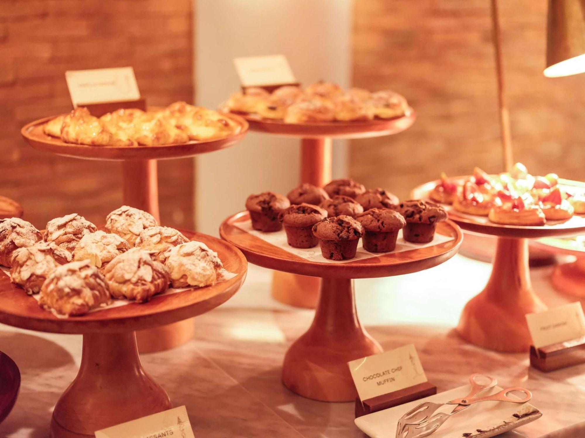 Nusa Dua Beach Hotel And Spa - Handwritten Collection Exterior photo A selection of pastries